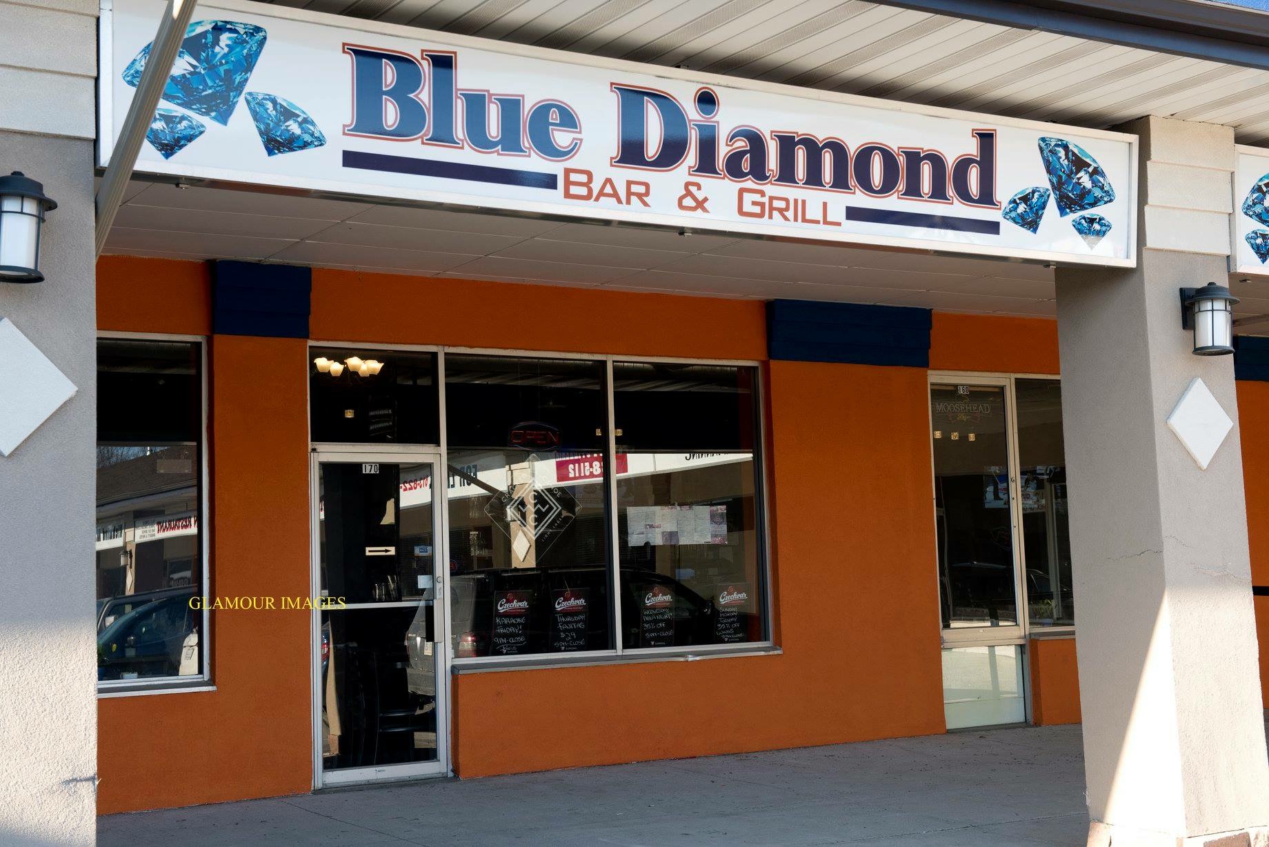 Blue Diamond Bar & Grill entrance with its blue and orange storefront sign